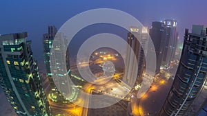 The skyline of the West Bay area from top in Doha day to night timelapse, Qatar.