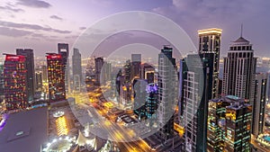 The skyline of the West Bay area from top in Doha day to night timelapse, Qatar.