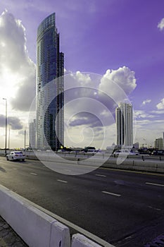 Skyscaper with blue sky and some ray light in background