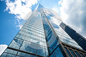 Skyscraper against sky building glass background photo