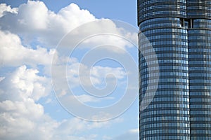 Skyscraper and blue sky with clouds in Vienna