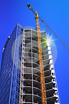 Skyscraper and building crane