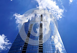 The Skyscraper building with mirrored panels a low viewing angle