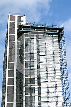 Skyscraper Building with Scaffolding Undergoing Renovations