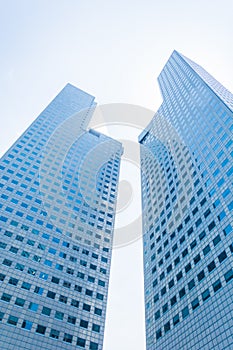 Skyscraper building at singapore - blue whitebalance processing photo