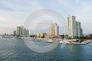 Skyscraper buildings on cloudy sky. Skyline district of miami, usa on sea shore. Architecture, structure, design. Building, constr