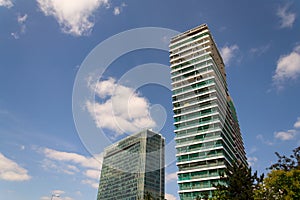 Skyscraper construction site with blue clear sky copy space background