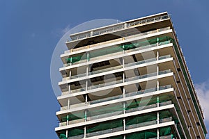 Skyscraper construction site with blue clear sky copy space background