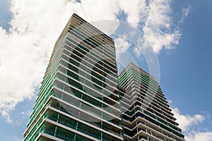 Skyscraper construction site with blue clear sky copy space background