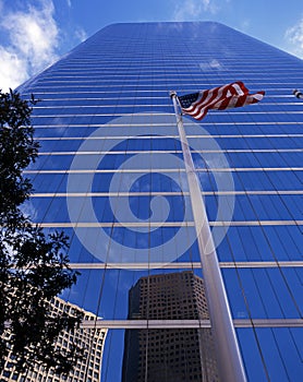 Skyscraper and flag, Houston, USA.