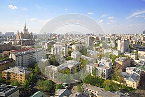 Skyscraper on Kudrinskaya Square and district Krasnaya Presnya at sunny day in Moscow, Russia