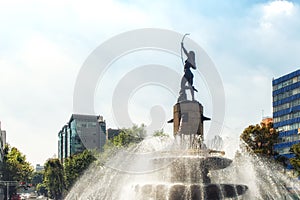 Skyscraper with La Diana Fountain in Mexico city, Mexico