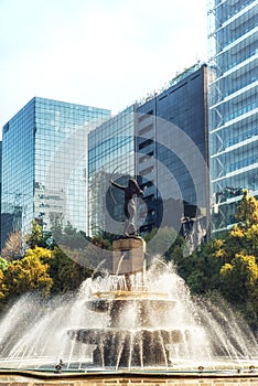Skyscraper with La Diana Fountain in Mexico city, Mexico
