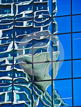 Skyscraper Reflections in Glass Windows, Distorted Image