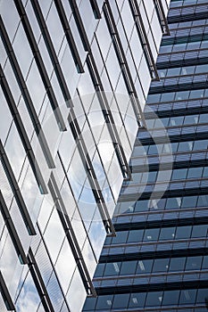 Skyscraper wall abstract background with repeated rectangular cells, mirrored glass wall