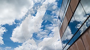 Skyscraper windows with reflection of the sky