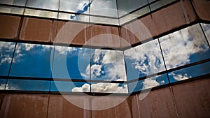 Skyscraper windows with reflection of the sky