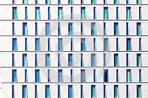 Skyscraper with windows structured in rows with differ