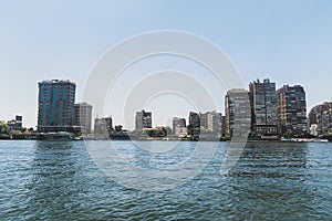 skyscrapers on the banks of the Nile river. Cairo view from Nile river, Egypt