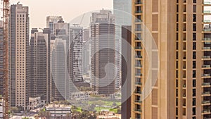 Skyscrapers at the Business Bay in Dubai aerial all day timelapse, United Arab Emirates