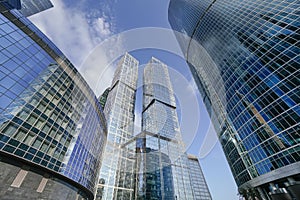 Skyscrapers in the business center, financial district, sunny day, blue sky, empty space, Moscow city, Russia