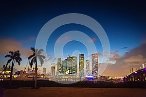 Skyscrapers in downtown Miami and MacArthur causeway at night