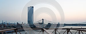 Skyscrapers at dusk of Manhattan as seen from the Brooklyn Bridge