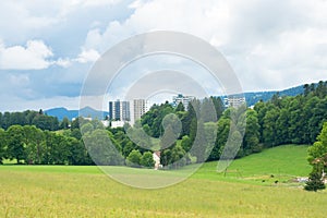 Skyscrapers of La-Chaux-de-Fonds, Switzerland, in the midst of the nature