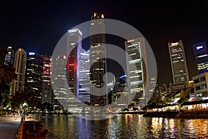 Skyscrapers at night by the water