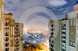 Skyscrapers with the noida cityscape showing between them