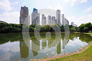 Skyscrapers reflecting in the pond of Areiao Park in Goiania, State of Goias, Brazil
