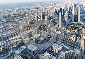 Skyscrapers and roads in Dubai city. UAE. View from the lookout Burj Khalifa.