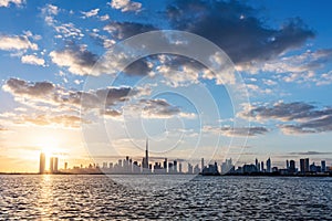 Skyscrapers skyline of Dubai UAE downtown with Burj Khalifa at sunset