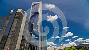 Skyscrapers timelapse hyperlapse in the Four Towers Business Area with the tallest skyscrapers in Madrid and Spain photo
