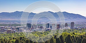 Skyscrapers towering above trees in Salt Lake City