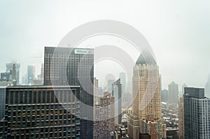 Skyscrapers and Towers in Manhattan on a Foggy Day of Winter. Aerial View of New York City Buildings