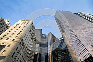 Skyscrapers of various sizes and ages from the 30`s till the 2000`s in downtown Toronto, Ontario, Canada during a sunny winter