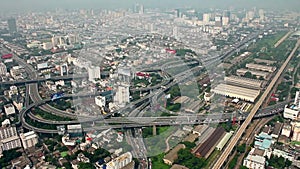 Skyskraber top view of Bangkok city transport interchange roads and high ways