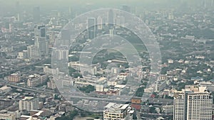 Skyskraber top view of Bangkok city transport interchange roads and high ways