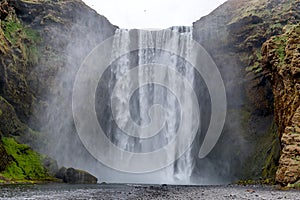 SkÃ³gafoss waterfall under MÃ½rdalsjÃ¶kull glacier