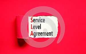 SLA service level agreement symbol. Concept words SLA service level agreement on beautiful white paper. Beautiful red paper