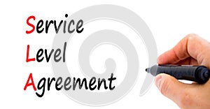 SLA service level agreement symbol. Concept words SLA service level agreement on beautiful white paper. Beautiful white background