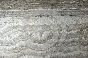 Slab natural stone with a beautiful hypnotic pattern, Travertino Titanium photo