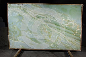Slab from natural stone green Onyx, considered to be semi-precious photo