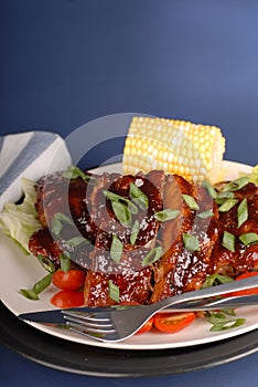 Slab of ribs with corn