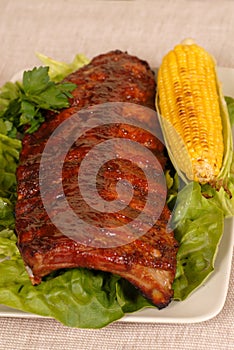 Slab of ribs with ear of corn