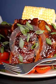 Slab of ribs with ear of corn