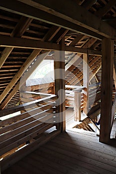 Slab of thick wooden beams in the attic of an old building