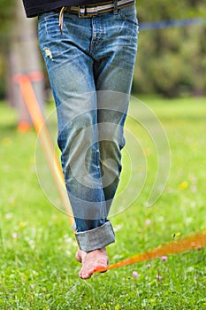 Slack line in the city park.
