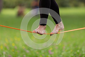 Slack line in the city park.